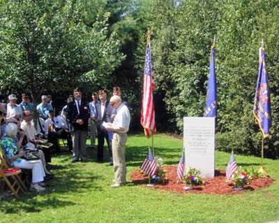 Joe Winsten, brother of Lieutenant Saul Winsten who was lost in the crash, speaks to those present at the ceremony after the unveiling of the monument.